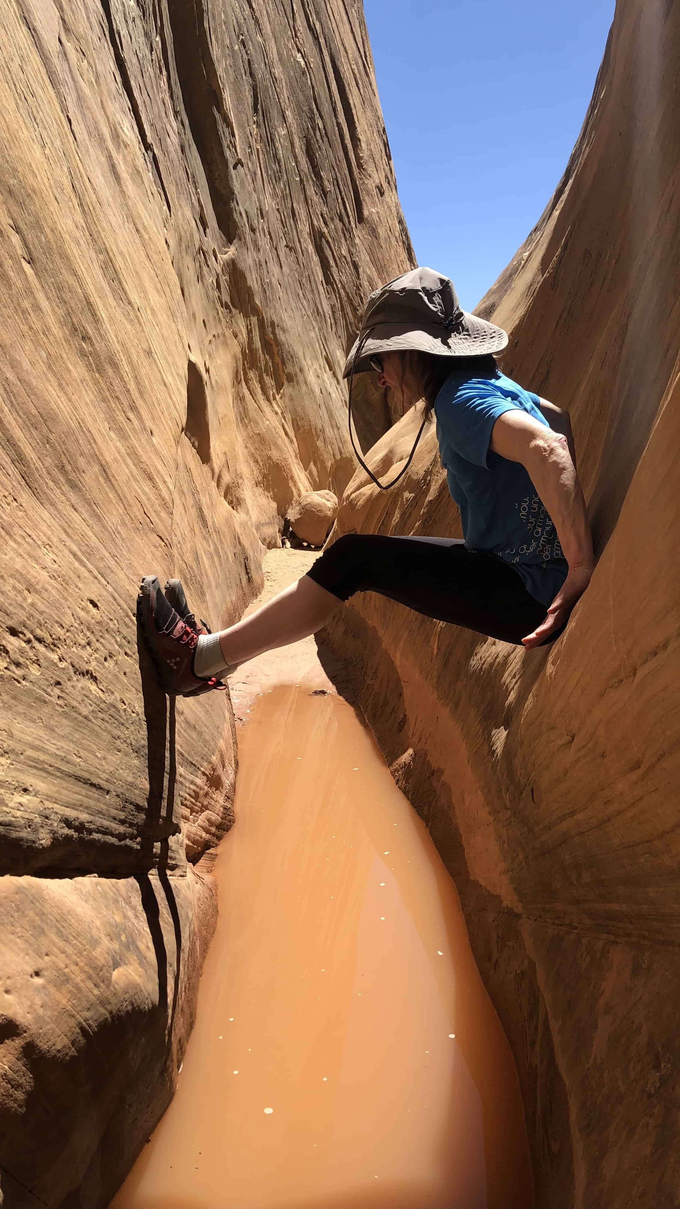 Stemming in a slot canyon in the San Rafael Swell.